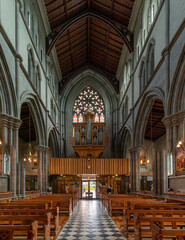 Fototapeta na wymiar view of the central nave of the St. Mary's Cathedral in Kilkenny with the church organ above the entrance