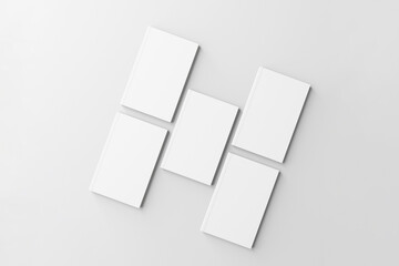 isolated on gray background. 5 white cover book mockup.