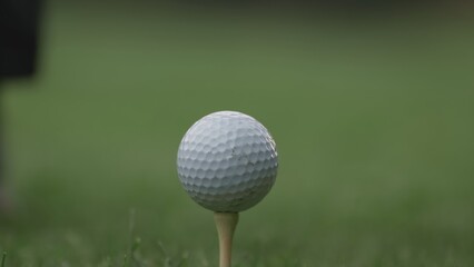 ECU Close up golf ball standing on the turf