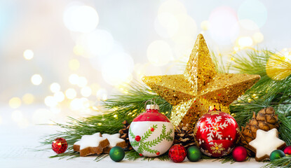 Christmas still life with Christmas Star and Balls, festive decoration and Christmas gingerbread cookies.