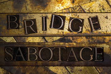 Bridge Sabotage text falling apart on grunge textured copper and gold background