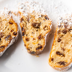 stollen christmas pie sweet pastries dried fruits, marzipan, nuts delicious snack healthy meal food snack diet on the table copy space food background rustic top view
