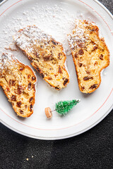 stollen christmas pie sweet pastries dried fruits, marzipan, nuts delicious snack healthy meal food snack diet on the table copy space food background rustic top view