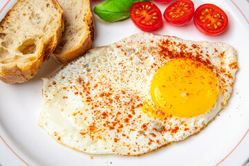 fried egg breakfast food, tomato, healthy meal snack on the table copy space food background 
