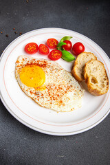 fried egg breakfast food, tomato, healthy meal snack on the table copy space food background 