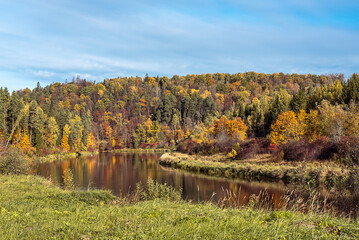 Landscape view of Gauja river valley in Sigulda, Latvia on sunny autumn day . - obrazy, fototapety, plakaty