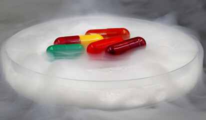 Medicines or pills in a freezing tank. Concept of scientific research in health