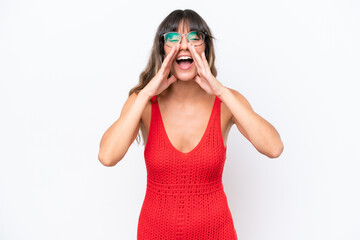 Young caucasian woman isolated on white background shouting and announcing something