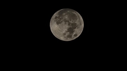 full moon over black