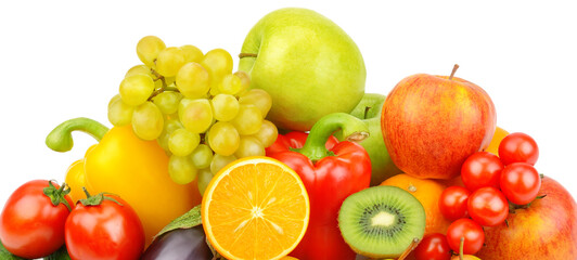 Fruits and vegetables on a platter isolated on a white . Wide photo.