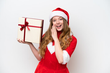 Young caucasian woman with Christmas dress holding gift isolated on white background whispering something