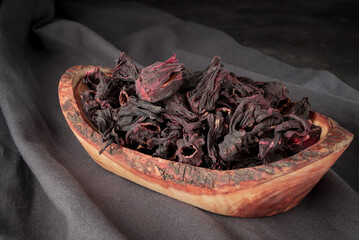 Dry hibiscus flowers in the  bowl,  DIY beauty treatment and spa.