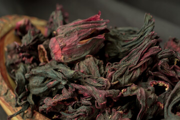 Dry hibiscus flowers in the  bowl,  DIY beauty treatment and spa.