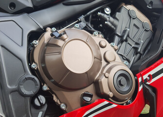 Side view of a motorcycle engine.