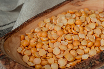 yellow split bean in the wooden spoon