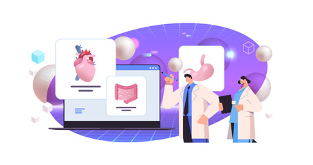 scientists examining anatomical human body internal organs on laptop screen anatomy medicine science