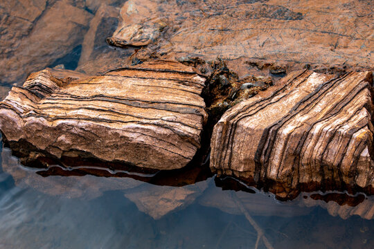 Brazilian Rocks with layers of different colors in selective focus.
