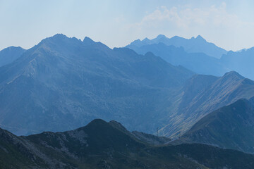 The Orobie valtellinesi alps, during a summer afternoon, seen from the San Marco pass near the village of Albaredo for San Marco, Italy - July 2022.