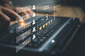 Fototapeta premium Customer service experience and business satisfaction survey concept. closeup Man hand using computer Notebook with virtual screen popup five star icon for feedback review satisfaction service.
