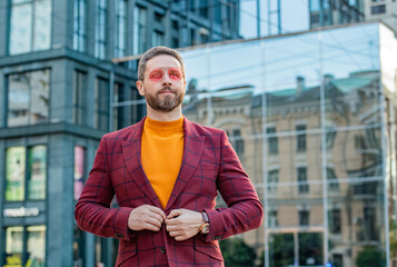 fashion man in trendy jacket, copy space. fashion man wear trendy outfit. trendy man outdoor.
