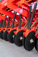 Precision seeder discs close-up for industrial design. Modern Modified Agricultural Seeder.