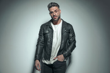 sexy casual man putting one hand in pocket