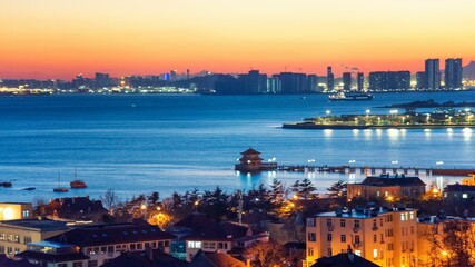 Seaside city scenery of Qingdao, Shandong Province, China during the sunset