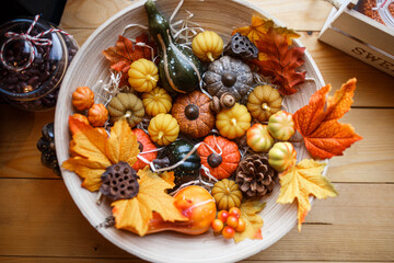 Different varieties of squashes and pumpkins on straw. Colorful vegetables top view