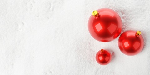 Three red christmas bauble balls on snow background with copy space flat lay top view from above, christmas or new year template