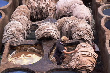 Men working at Chouara tannery in the old town of Fez
