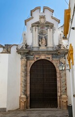 A facade of a house with a mix of the Mudejar and Christian styles, Cordoba, Spain