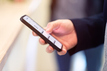 Conference Staff Member scan a QR code from attendee upon arrival to check-in site
