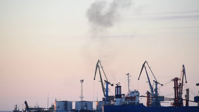 Smoke over port. Sea trade port