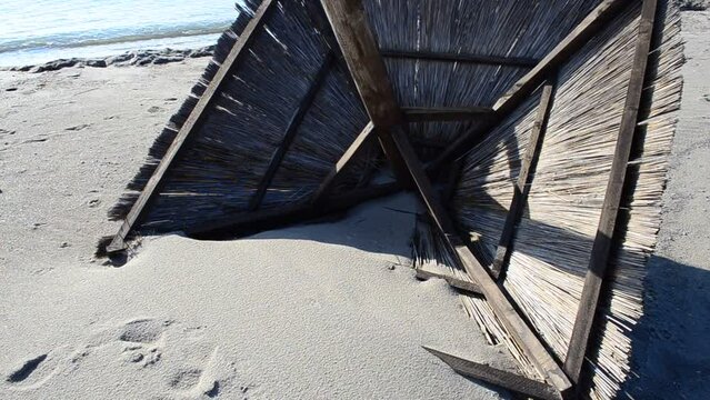 Straw and canopies. Canopies on a beach