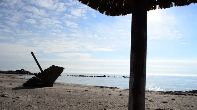 Beach and sky. Straw beach