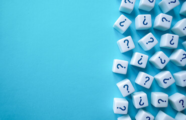 Scattered question marks blocks and copy space. Find an answer to a problem. Reasoning and...