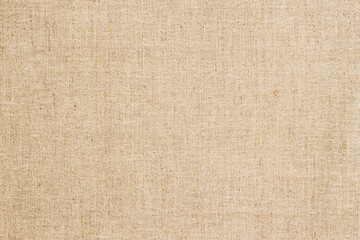 Naklejka na ściany i meble Hessian sackcloth background, beige craft color. Natural burlap canvas