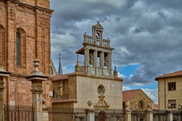 Exterior view of Iglesia de Santa Marta Catholic church in Astorga, Spain under sunset sky