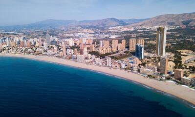 Panoramic aerial view of coast line at Benidorm with view of buildings and sea, Spain