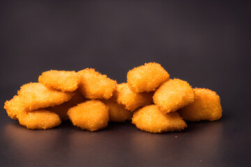 picture of chicken nuggets, made of processed meat, a tasty fast food, savory