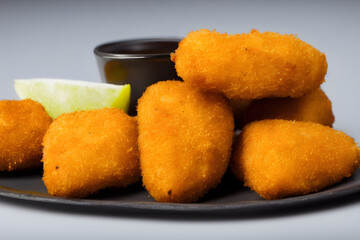 picture of chicken nuggets, made of processed meat, a tasty fast food, savory