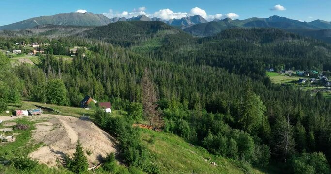 Aerial view of the Tatra Mountains. Drone flight over the Tatra Mountains with a view of the mountain peaks. High rocky mountains.