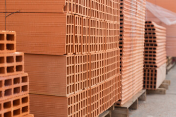 Pallets with bricks in a warehouse of a brick factory