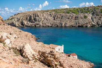 Cala Morell en isla de menorca mar mediterraneo con mar azul