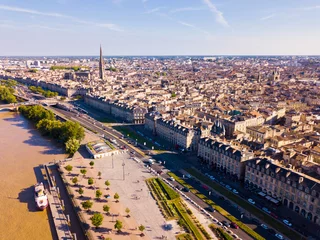 Fotobehang Aerial cityscape of French city Bordeaux and Garonne river © JackF