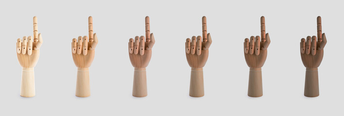 Collage of wooden mannequin hands on light background