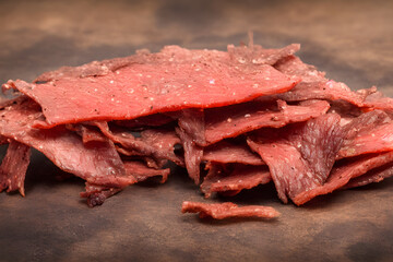 picture of beef jerky, dried meat, a food item with long shelf life