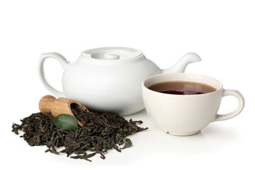 Scoop of dry puer tea with cup and teapot on white background