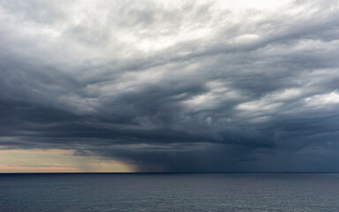 Obraz premium Dramatic sky and clouds during a storm over Mediterranean Sea, Valencia, Spain, Europe