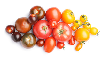 Heap of different tomatoes on white background